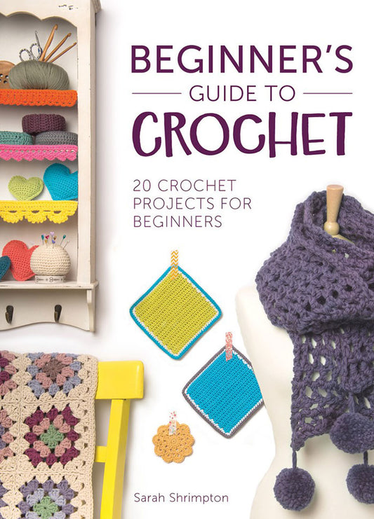 Cover of Beginner’s Guide to Crochet, featuring a clean, minimalist design with a soft pastel background. The title is displayed in bold, modern typography at the center, accompanied by a subtle illustration of a crochet hook and yarn.