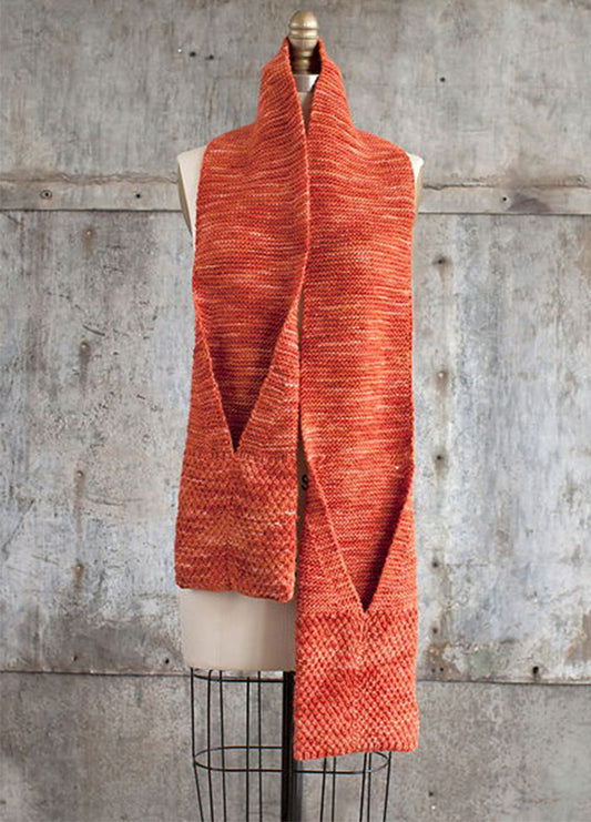 Camote Pocket Scarf on mannequin, hand-knit in orange and red with two large front pockets