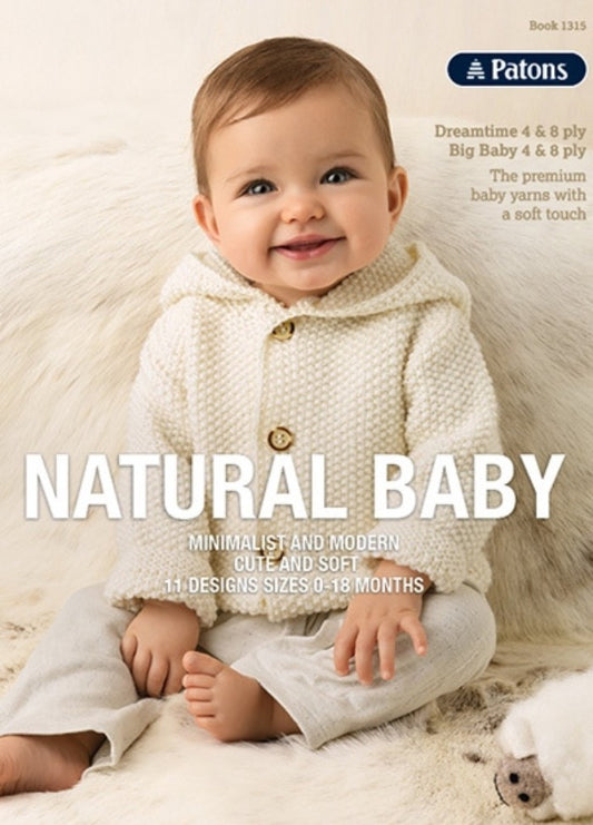 A baby wearing a cozy, textured cream hooded sweater and light pants sits smiling on a soft white fur background. The mood is warm and comforting, conveying a minimalist and modern style. Text on the image promotes natural baby designs for infants.
