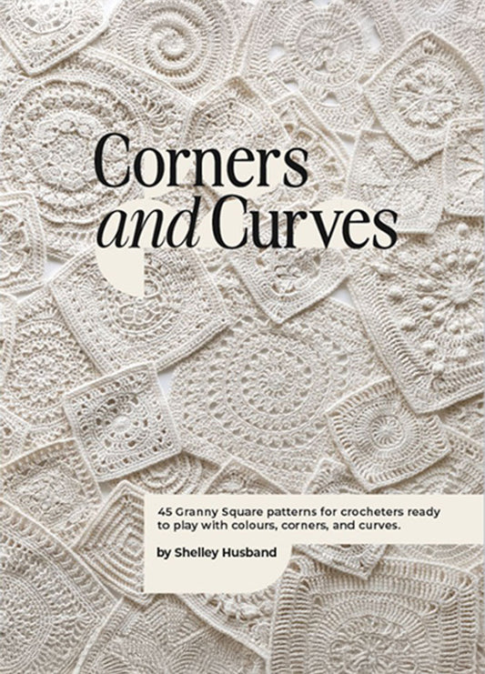 A textured cover featuring various intricately crocheted granny squares in white. The title "Corners and Curves" overlays the pattern, conveying a sense of craftsmanship.
