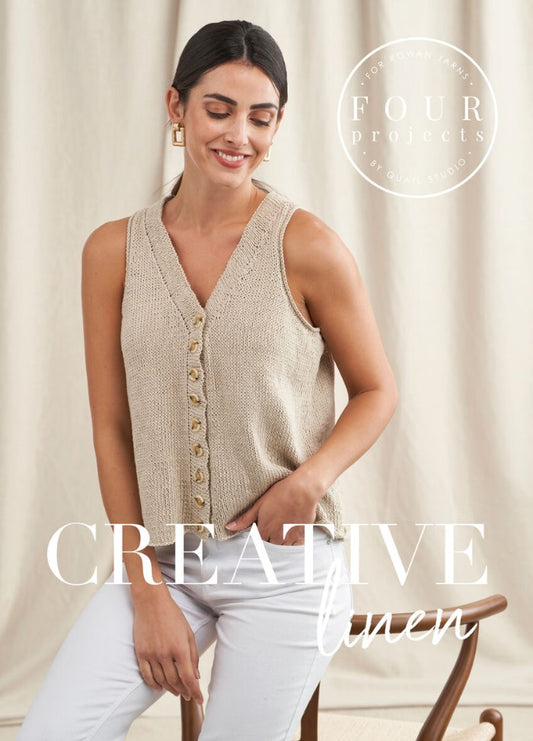 Woman in a beige knitted vest with buttons, seated on a wooden chair against a beige curtain backdrop. Text overlay: "Creative Linen." Calm and stylish tone.