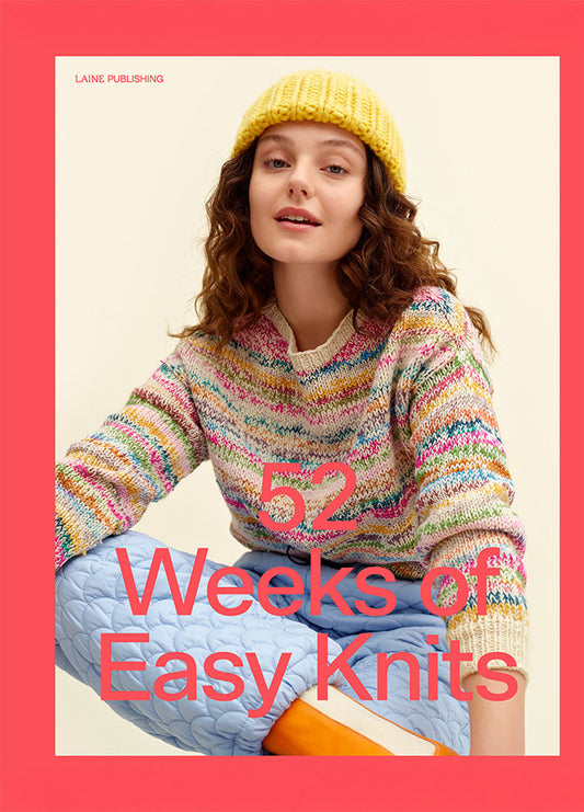 52 Weeks of Easy Knits: person wearing a colorful knitted sweater, blue quilted pants, and orange shoes; face obscured