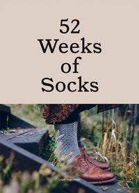 52 Weeks of Socks: person wearing gray knitted socks and brown leather shoes standing on wooden steps outdoors, surrounded by greenery