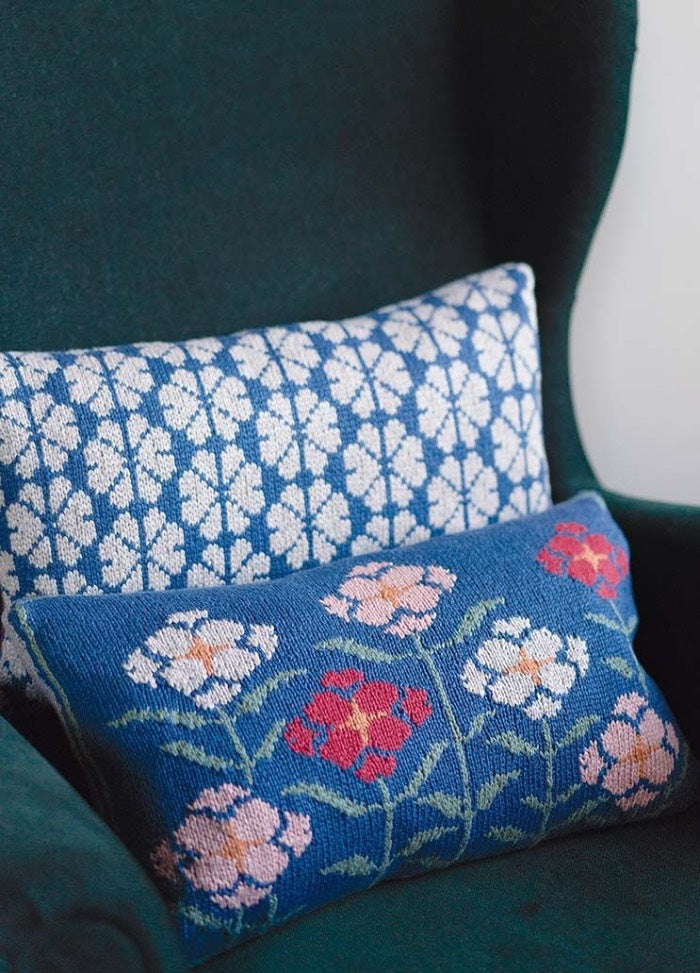Agda cushion with pretty floral motifs on both sides, inspired by rural Norwegian heritage; knitted in Softyak DK.