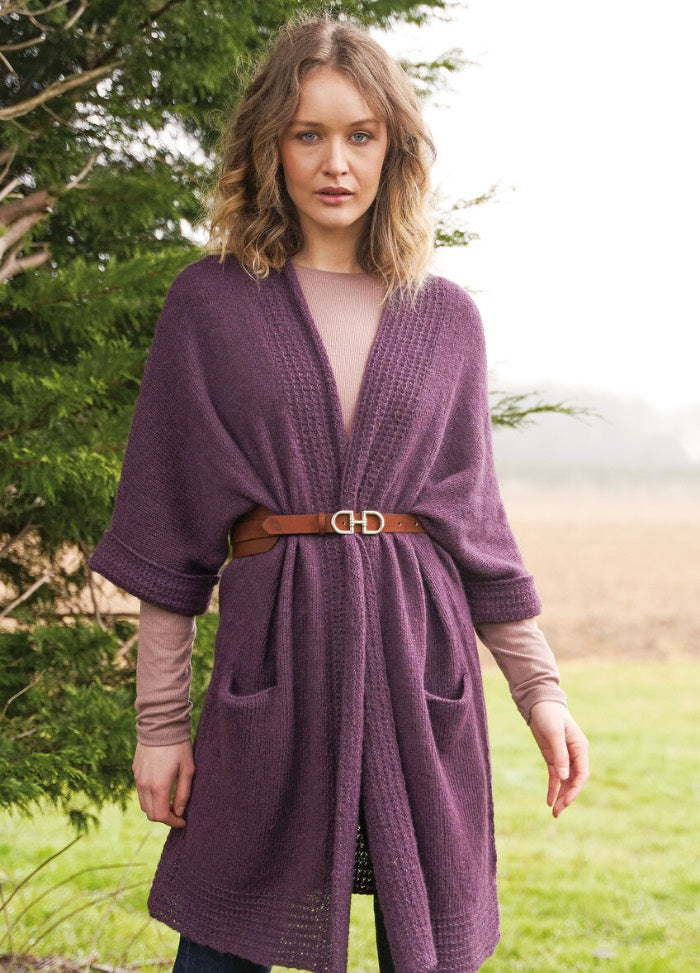 Long-length cardigan with deep textured front bands, smooth stocking-stitch body, integral sleeves and pockets; lightweight drape in Alpaca Classic.