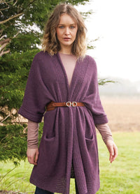 Long-length cardigan with deep textured front bands, smooth stocking-stitch body, integral sleeves and pockets; lightweight drape in Alpaca Classic.