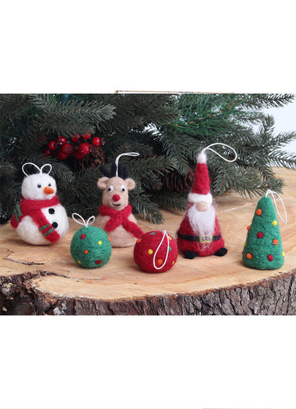 Christmas Needle Felted kit next to a Christmas three
