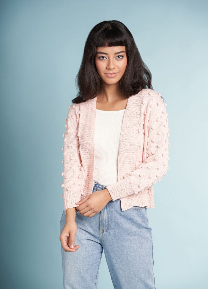 Blushes knitting pattern, a romantic pastel pink top with gentle shaping and lightweight yarn for summer wear.