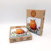 Two cardboard boxes with Highland Cow craft kit on a white background