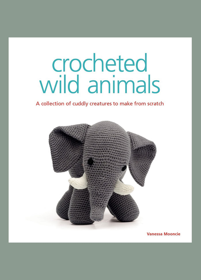 Cover of “Crocheted Wild Animals” by Vanessa Mooncie, featuring a crocheted elephant with large ears and tusks. The subtitle reads “A collection of cuddly creatures to make from scratch,” highlighting the book’s focus on handmade animal designs.
