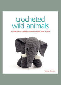 Cover of “Crocheted Wild Animals” by Vanessa Mooncie, featuring a crocheted elephant with large ears and tusks. The subtitle reads “A collection of cuddly creatures to make from scratch,” highlighting the book’s focus on handmade animal designs.