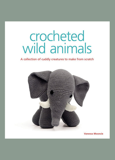Cover of “Crocheted Wild Animals” by Vanessa Mooncie, featuring a crocheted elephant with large ears and tusks. The subtitle reads “A collection of cuddly creatures to make from scratch,” highlighting the book’s focus on handmade animal designs.