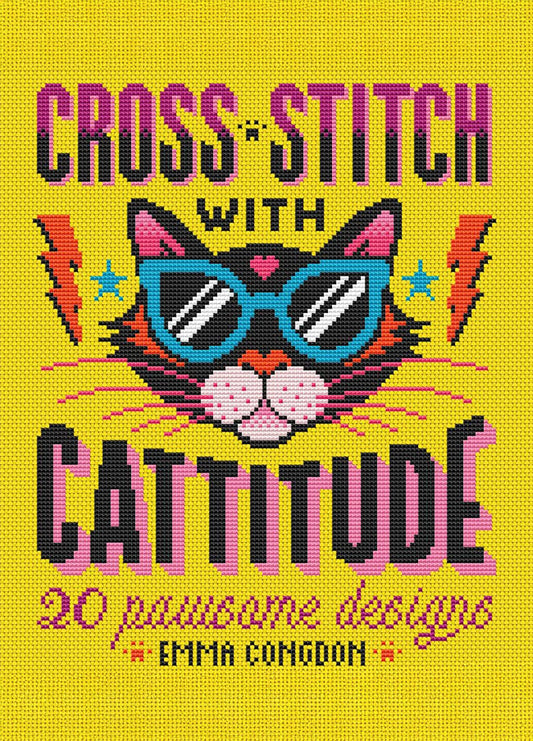 Cover of “Cross Stitch with Cattitude” by Emma Congdon, featuring a cross-stitched cat face with pink ears and blue sunglasses on a yellow background. Surrounded by stars and lightning bolts, the design highlights the book’s playful theme. Text reads “20 pawsome designs.”