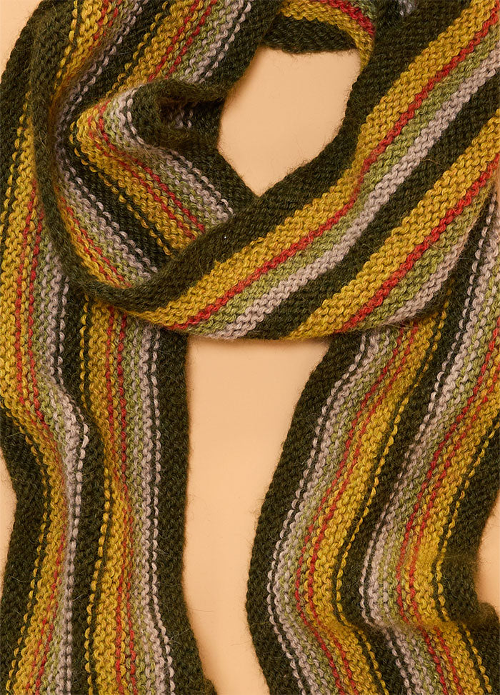 Hand-knitted scarf with horizontal stripes in dark green, yellow, red, light gray, and light green, made from thick yarn with a textured pattern – vibrant and cozy accessory for cooler weather.