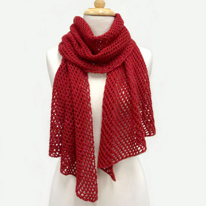 Easy 4 Ply Lace Scarf in red, featuring a delicate openwork pattern, draped around a mannequin’s neck with both ends hanging down.