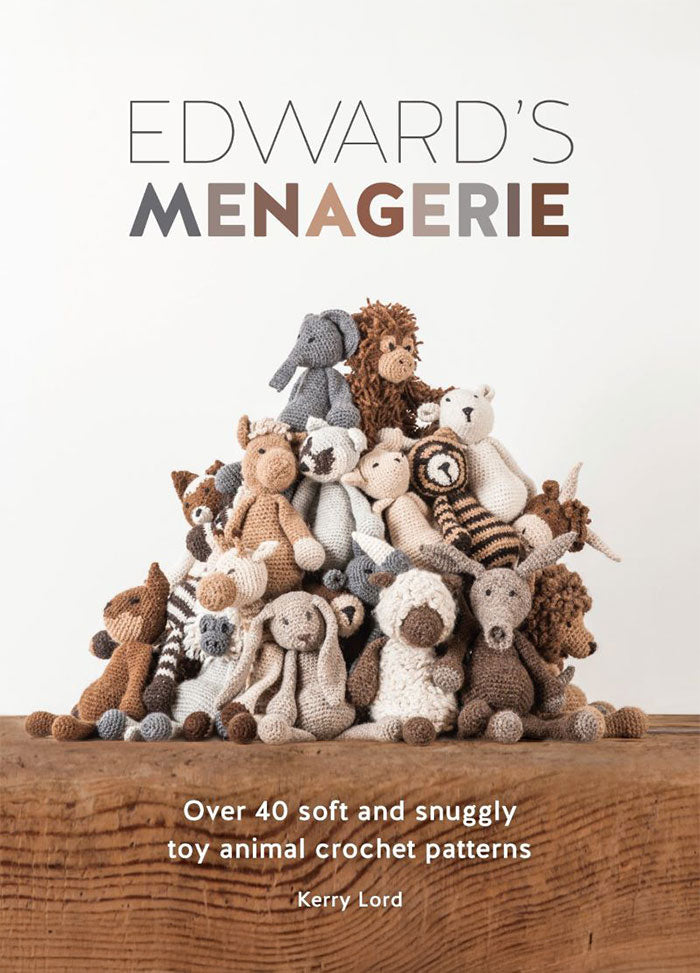 Cover of “Edward’s Menagerie” by Kerry Lord, featuring a pile of crocheted toy animals including elephants, lions, bears, and more. The subtitle reads “Over 40 soft and snuggly toy animal crochet patterns,” highlighting the book’s focus on handmade animal designs.