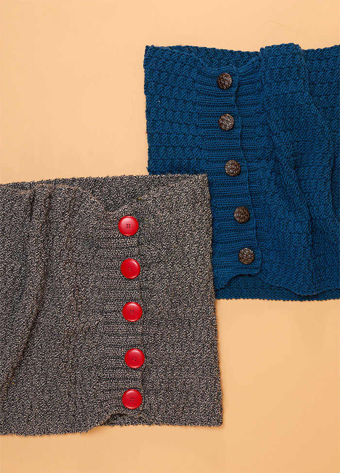 Two textured knit scarves are displayed on a beige background. One is charcoal gray with large red buttons, and the other is blue with brown buttons.