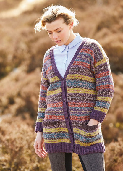 A longline button-front cardigan showcasing all-over Fair Isle in six colours of Felted Tweed, complete with long sleeves and practical patch pockets.
