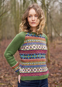 Vibrant Fair Isle pullover with layered bands of colourwork across body and cuffs; plain raglan sleeves and crew neck; worked in eight shades of Alpaca Soft DK.