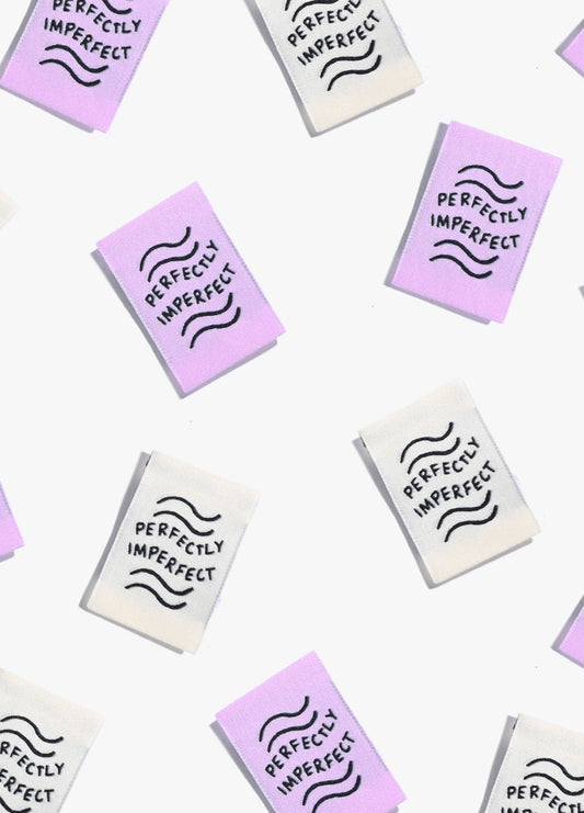 Perfectly Imperfect Sew-in Labels scattered