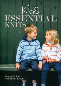 Front Cover: Two children wearing hand-knitted sweaters sit on a bench. The cover text reads ‚ÄòKids Essential Knits ‚Äì ten hand knit children's designs.‚Äô
