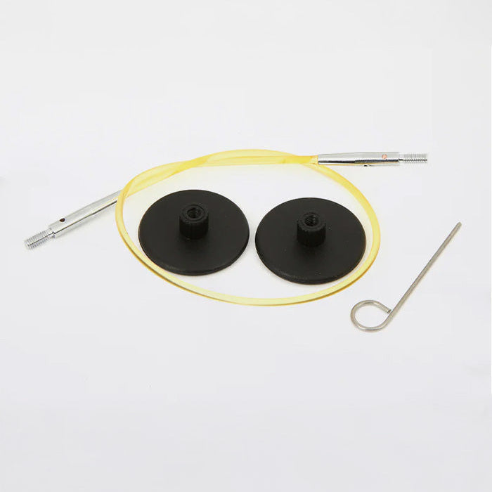 Interchangeable yellow and black cables with a screw, suitable for KnitPro tips, ensuring a secure connection for knitting.