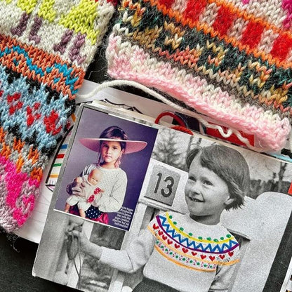 Image from “Knit It Out” featuring colorful knitted swatches with various patterns, alongside a printed page showing two children in vibrant knitted sweaters. The children’s faces are not visible.