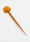 A beautifully crafted wooden hair comb with a floral accent, ideal for those who appreciate simple yet stylish hair ornaments