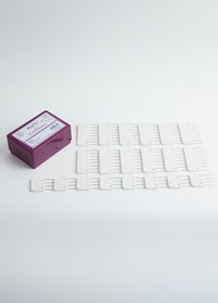A white plastic tray containing 20 knit blockers with durable pins, designed for securing and maintaining tension in knit projects.