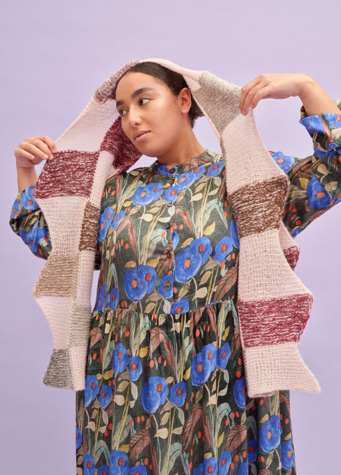 Colour Field Scarf: long scarf with beige, brown, and maroon color blocks held above head