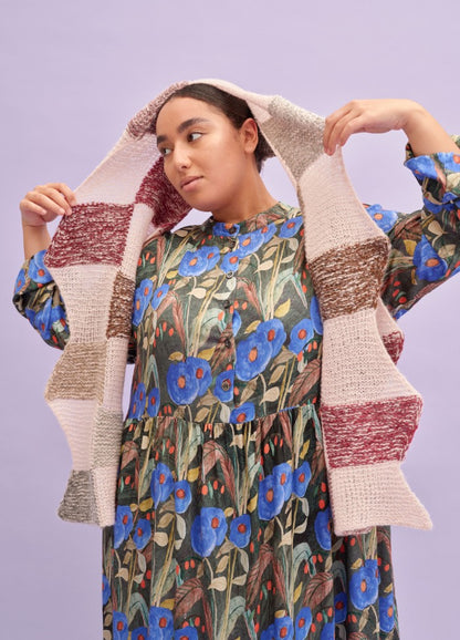 Colour Field Scarf: long scarf with beige, brown, and maroon color blocks held above head