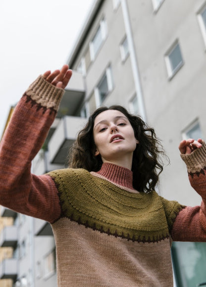 Funky Turtle Pullover: green, brown, and beige turtleneck knit in an urban setting