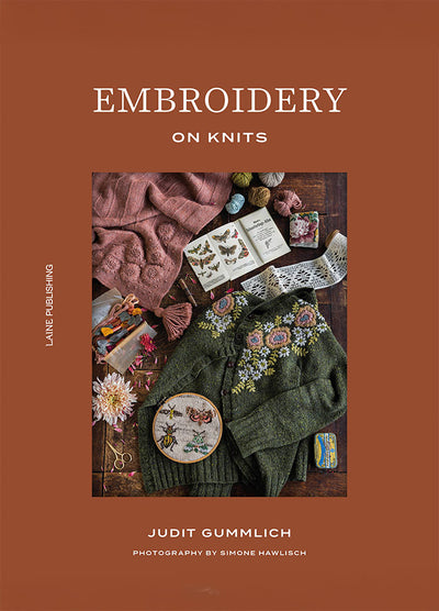 Embroidery on Knits: cover featuring embroidered hoops, yarn, and butterfly motifs on knitwear.