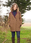Statement Fair Isle coatigan with shawl collar, raglan shaping, double-breasted button front and pockets in cosy Alpaca Soft DK.