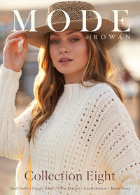 Woman in a cream knit sweater and straw hat gazes confidently towards the camera. The warm sunlight enhances the relaxed, stylish mood. Text reads: "MODE at ROWAN, Collection Eight."