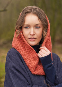 Tactile in-the-round cowl using a simple four-row repeat for rhythmic texture; shown in Alpaca Soft DK for a soft pop of warmth and colour.