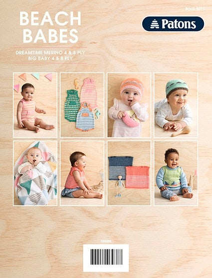 Magazine cover featuring 'Beach Babes' collection by Patons. It shows infants in colourful knitwear, including cardigans, hats, and blankets, on a light wood background. The tone is playful and cozy, highlighting baby fashion in soft, pastel hues.