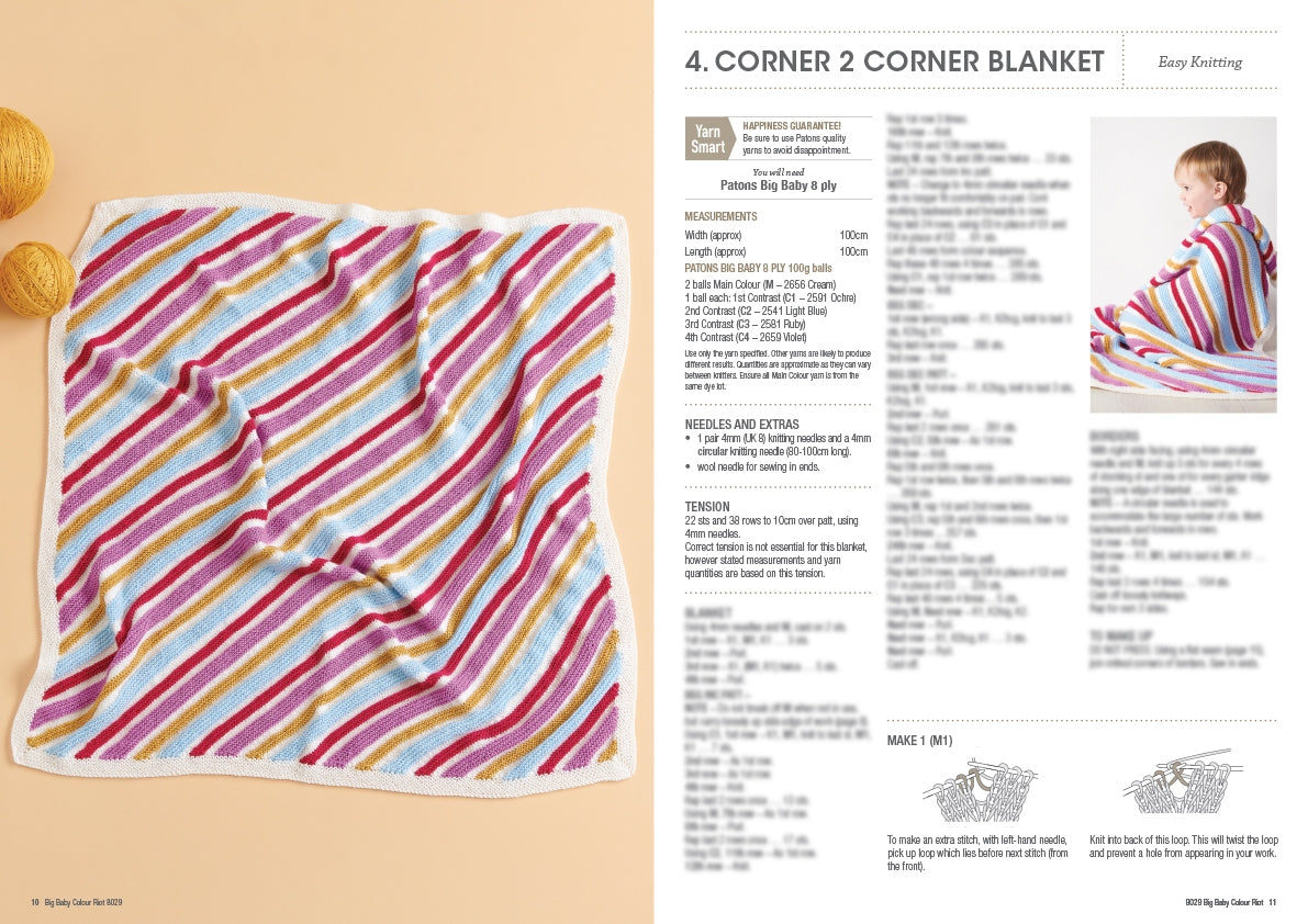 A colorful, striped knitted blanket lies flat, featuring pink, yellow, and blue diagonal lines. On the right, blurred text describes knitting instructions.