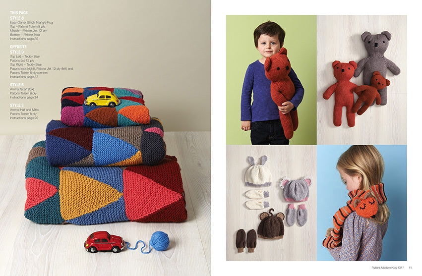 Colorful geometric rugs are stacked with toy cars on top. A child hugs a red knitted bear, while cozy hats, mittens, and a tiger scarf are displayed nearby. Bright and playful mood.