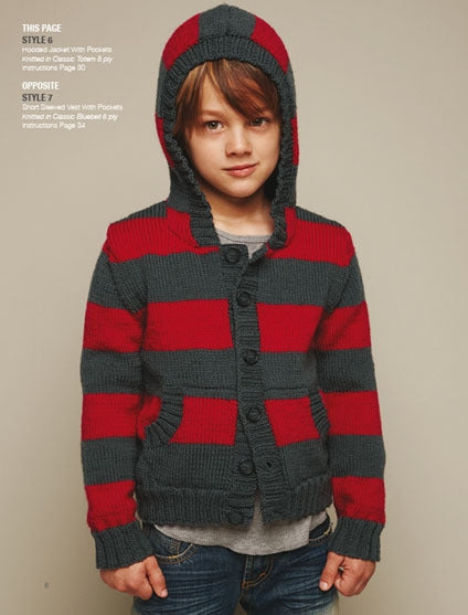 Young child wearing a red and gray striped hooded cardigan with front pockets, buttons, and jeans stands confidently against a neutral background. Cozy and casual tone.