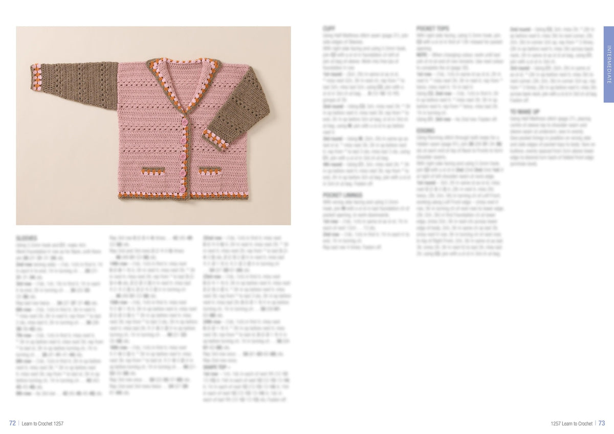 Two-tone crocheted cardigan on a beige background, featuring pink and brown sections with decorative edging. Accompanied by blurred text instructions.