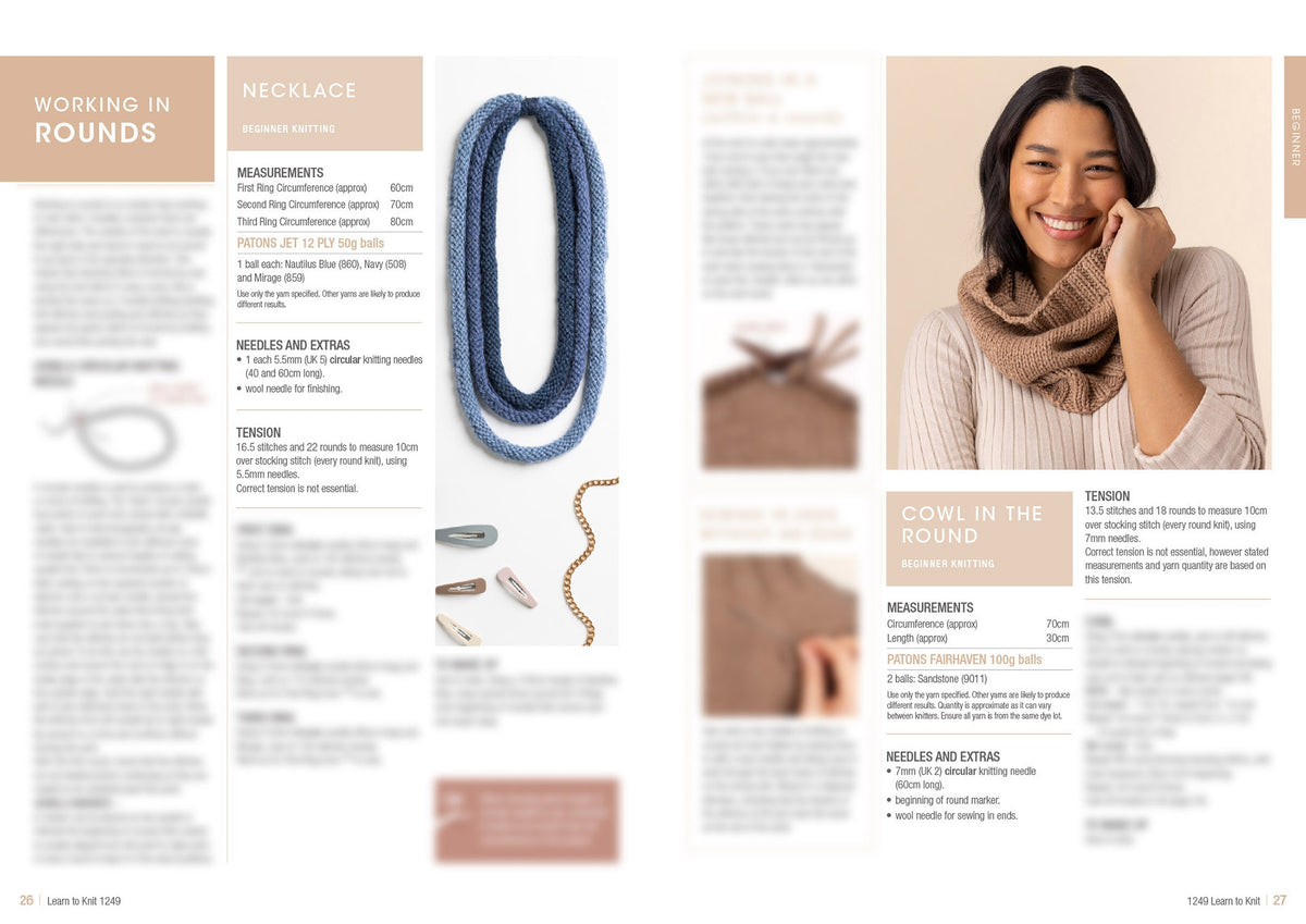 The image displays a magazine spread for knitting projects. The left page features necklace patterns with blue and gray yarns, along with tools like needles and clips. The right page shows a smiling person wearing a knitted cowl, suggesting a warm and cozy feel. Text includes project instructions, measurements, and materials. The overall tone is inviting and creative.