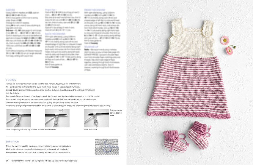 A knitted baby dress with pink and white stripes is displayed on a textured background, alongside matching booties and two pink daisies. Instructions and patterns appear on the left. The tone is soft and cozy.
