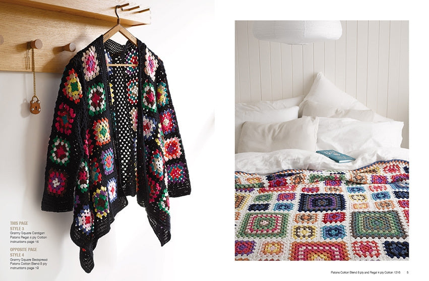 A colorful granny square cardigan hangs on a wooden peg, beside a bed adorned with a matching patchwork blanket. The scene feels cozy and inviting.