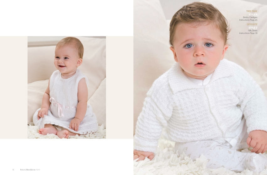 A baby girl smiles while sitting in a white dress with a pink ribbon on the left. On the right, a baby boy with a curious expression wears a white cardigan. Both are on a soft, white surface.