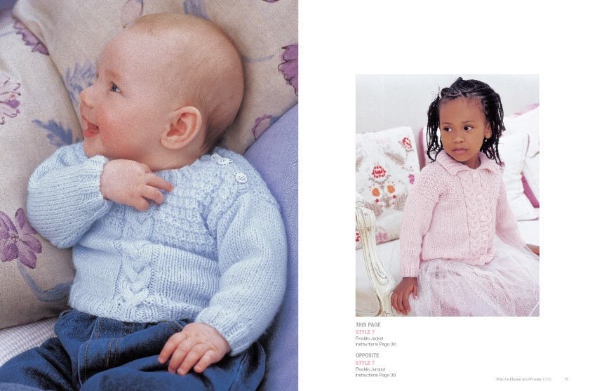 Baby in a blue knit sweater smiles on floral cushions; a young girl in a pink sweater and tulle skirt looks serious on floral pillows. Cozy and tender mood.