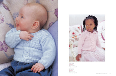 Baby in a blue knit sweater smiles on floral cushions; a young girl in a pink sweater and tulle skirt looks serious on floral pillows. Cozy and tender mood.