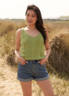 Pea knit top pattern from Essential Pastels, a short-sleeved pastel green sweater with clean lines and soft texture using Rowan Summerlite DK yarn.
