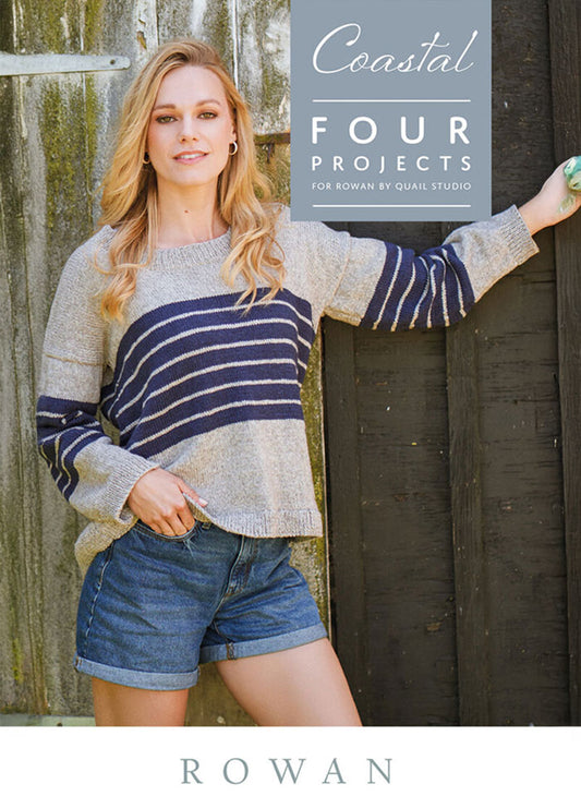 Woman in a striped sweater and denim shorts leans against a rustic wooden wall, exuding a relaxed, coastal vibe. Text: "Coastal Four Projects, Rowan."