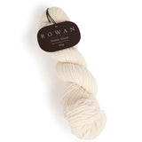 Rowan's white wool yarn, 100% merino, 10ply weight, sourced from the Falkland Islands, exemplifying fine craftsmanship and quality.